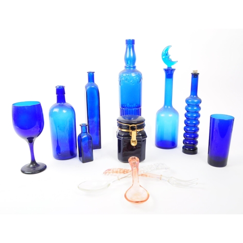 116 - A collection of 20th century Bristol Blue glass. To include bobbin turn glass bud vase / decanter, d... 