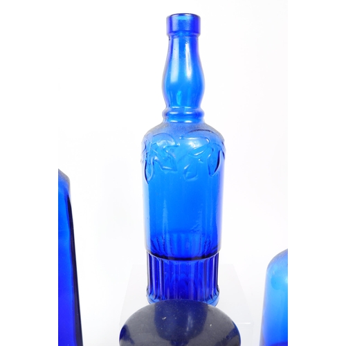 116 - A collection of 20th century Bristol Blue glass. To include bobbin turn glass bud vase / decanter, d... 