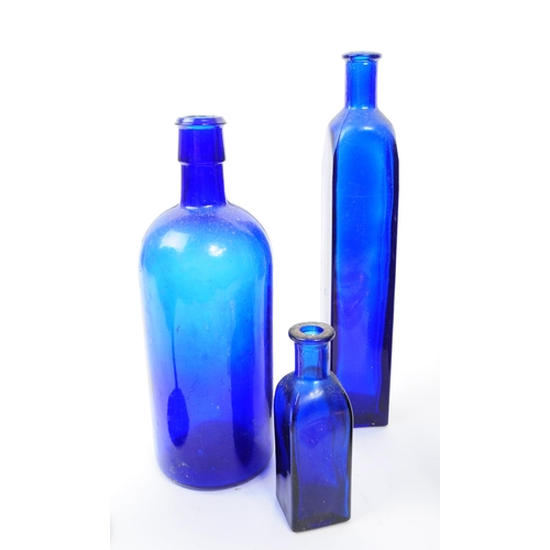 116 - A collection of 20th century Bristol Blue glass. To include bobbin turn glass bud vase / decanter, d... 