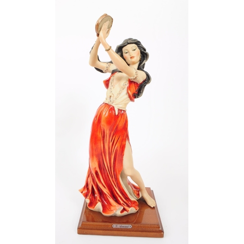 18 - G Armani - Capodimonte - A collection of three vintage 20th century porcelain bisque figurines. Incl... 