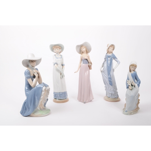 23 - Nao / Lladro—A collection of vintage 20th-century Spanish porcelain figures/statues. All depict fema... 