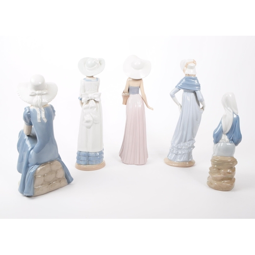 23 - Nao / Lladro—A collection of vintage 20th-century Spanish porcelain figures/statues. All depict fema... 