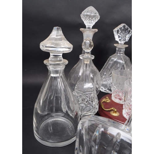 29 - Large collection of vintage 20th century cut glass crystal decanters, some with stoppers and jugs. ... 