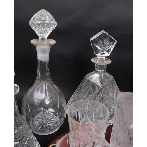 29 - Large collection of vintage 20th century cut glass crystal decanters, some with stoppers and jugs. ... 