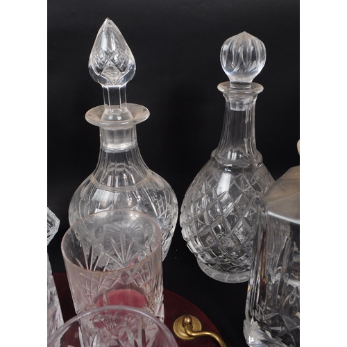 29 - Large collection of vintage 20th century cut glass crystal decanters, some with stoppers and jugs. ... 