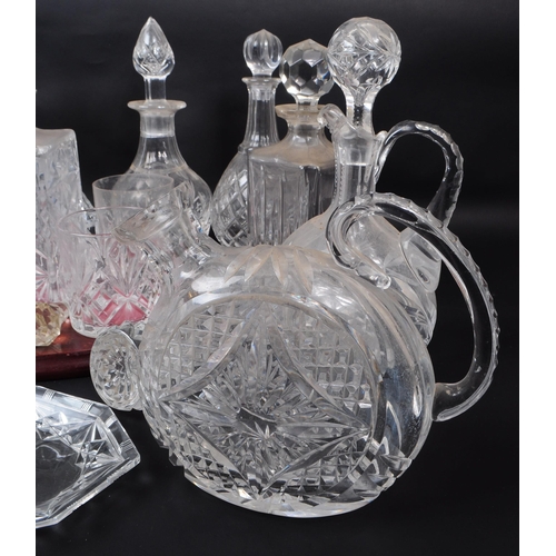 29 - Large collection of vintage 20th century cut glass crystal decanters, some with stoppers and jugs. ... 