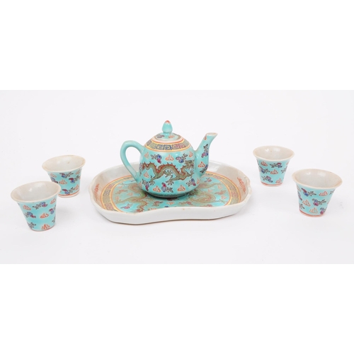 30 - An early 20th century Chinese miniature / dolls house porcelain tea / coffee set. Compirising of tea... 