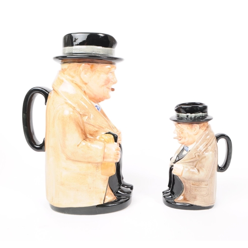 33 - Royal Doulton - Winston Churchill - Two vintage 20th century ceramic pottery character jugs. Winston... 