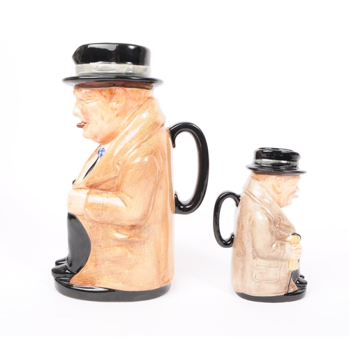 33 - Royal Doulton - Winston Churchill - Two vintage 20th century ceramic pottery character jugs. Winston... 