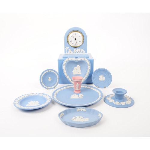 37 - Wedgwood - Jasperware - A collection of porcelain table ware pieces. In the tradional light blue bis... 