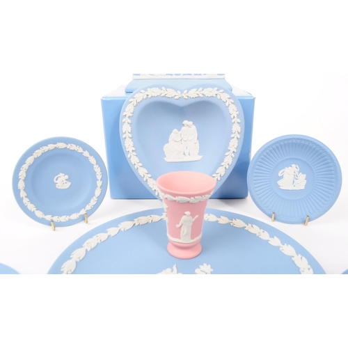 37 - Wedgwood - Jasperware - A collection of porcelain table ware pieces. In the tradional light blue bis... 