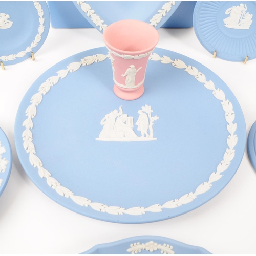 37 - Wedgwood - Jasperware - A collection of porcelain table ware pieces. In the tradional light blue bis... 