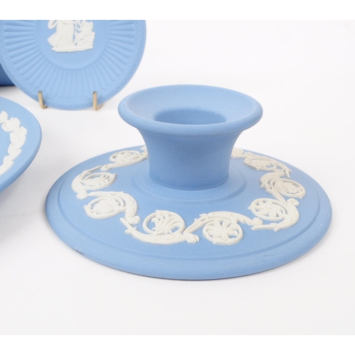 37 - Wedgwood - Jasperware - A collection of porcelain table ware pieces. In the tradional light blue bis... 