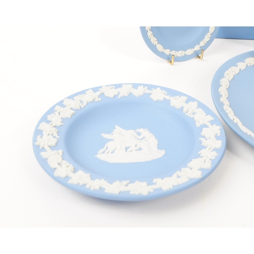 37 - Wedgwood - Jasperware - A collection of porcelain table ware pieces. In the tradional light blue bis... 