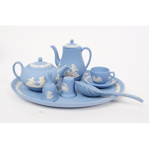 38 - Wedgwood - Jasperware - A vintage 20th century porcelain doll's tea service set. Including teapot, c... 