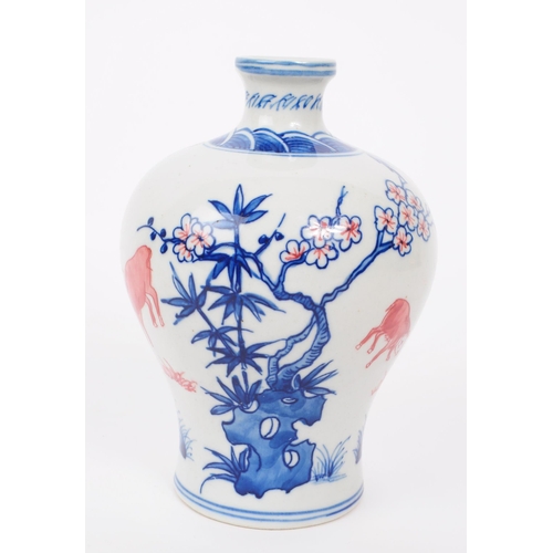 49 - An early 20th century Chinese Meiji period porcelain vase. The vase of bulbous form, with rounded ba... 