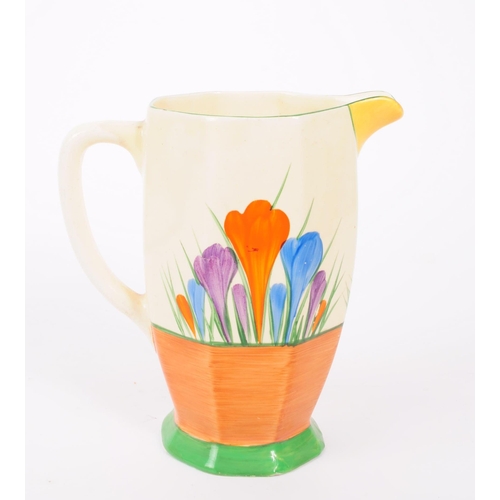 5 - Clarice Cliff - A mid 20th century Clarice Cliffe Bizzare Crocus jug. The jug having a white ground,... 