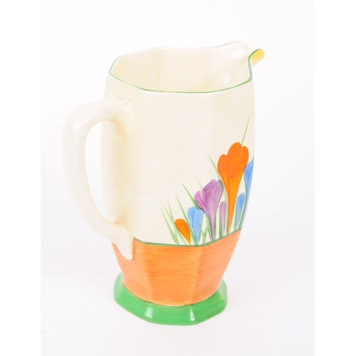 5 - Clarice Cliff - A mid 20th century Clarice Cliffe Bizzare Crocus jug. The jug having a white ground,... 