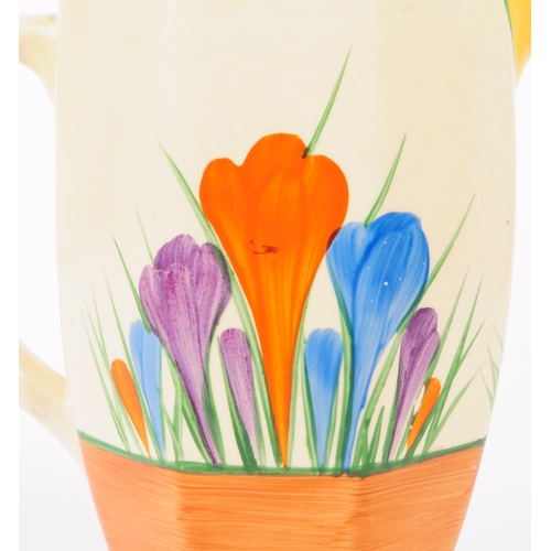 5 - Clarice Cliff - A mid 20th century Clarice Cliffe Bizzare Crocus jug. The jug having a white ground,... 