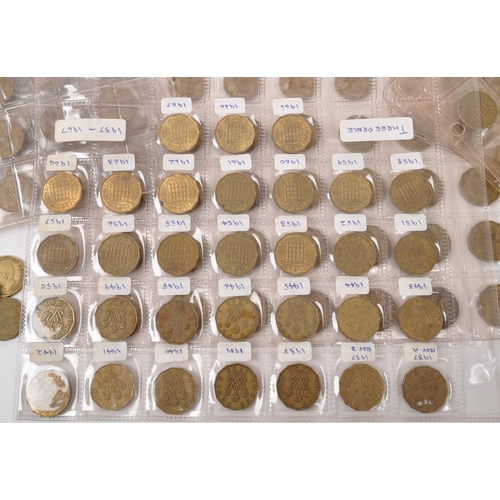 548 - An extensive collection of post-1937 brass three pence coins. The collection to include an example o... 