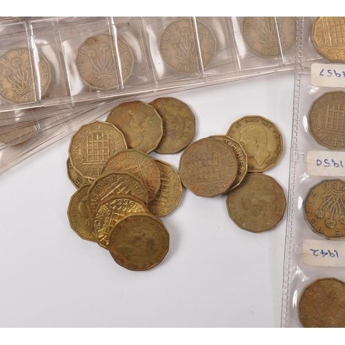 548 - An extensive collection of post-1937 brass three pence coins. The collection to include an example o... 