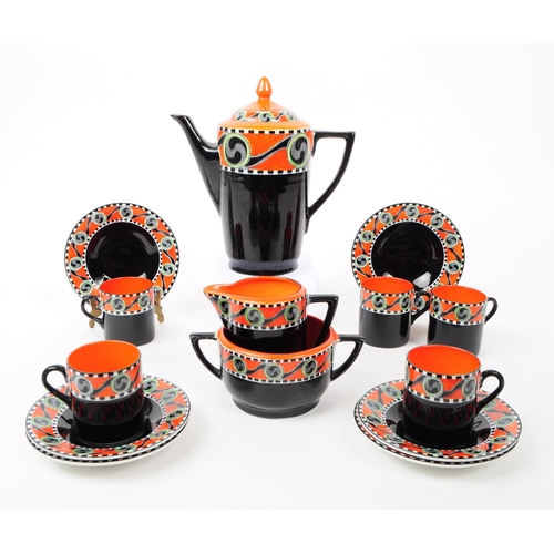 57 - Soho Pottery - Solian Ware - An Art Deco porcelain china coffee service. To include cups, saucers, m... 