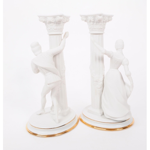 63 - Franklin Mint - Two late 20th century porcelain figures / statues. Romeo & Juliet candlesticks. ... 