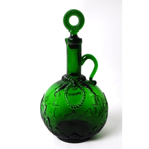 71 - Victorian 19th century green glass wine decanter with stopper. Of ovoid form with foliate relief to ... 