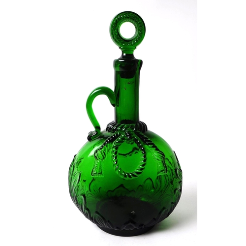 71 - Victorian 19th century green glass wine decanter with stopper. Of ovoid form with foliate relief to ... 