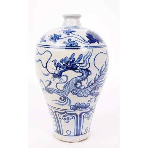 73 - 19th century Meiping blue and white dragon stem / bud vase. Narrow base into a bulbous top with narr... 