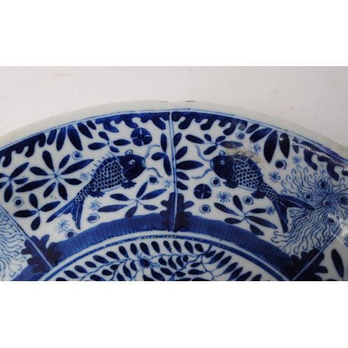 76 - A 1860s 19th century Chinese ocean sea blue and white plate ceramic. Depicting sea creatures to surr... 