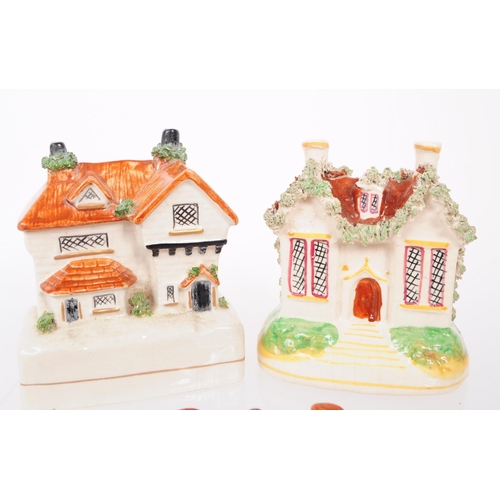 8 - A collection of 19th and 20th century ceramic cottages. The collection to include a selection of dif... 