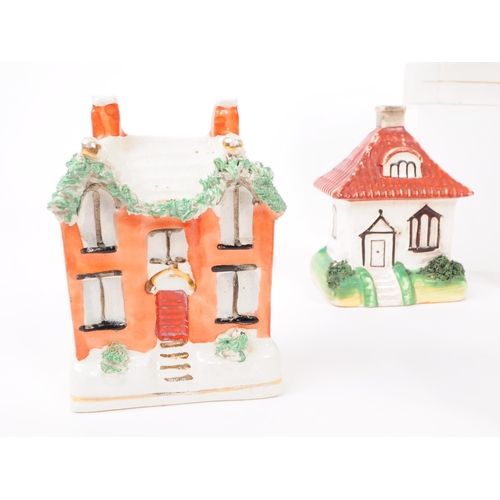 8 - A collection of 19th and 20th century ceramic cottages. The collection to include a selection of dif... 