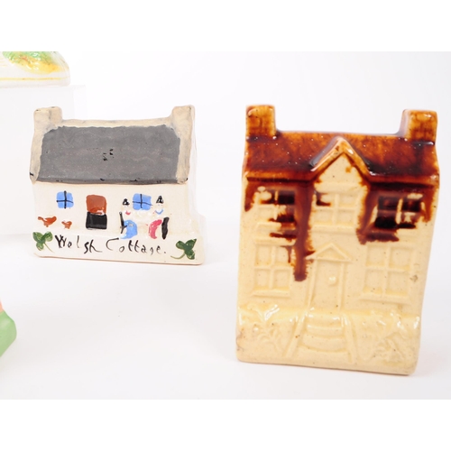 8 - A collection of 19th and 20th century ceramic cottages. The collection to include a selection of dif... 