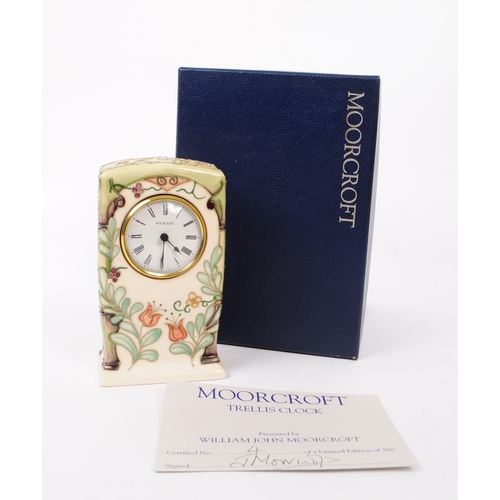 86 - Moorcroft Pottery - a limited edition hand painted ceramic Trellis Clock desk table clock. Limited e... 