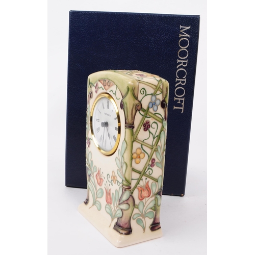 86 - Moorcroft Pottery - a limited edition hand painted ceramic Trellis Clock desk table clock. Limited e... 