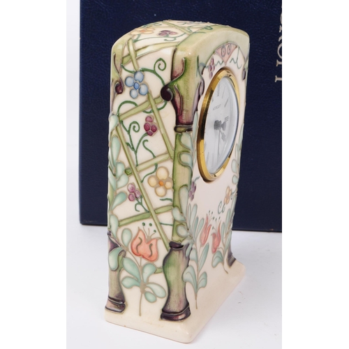 86 - Moorcroft Pottery - a limited edition hand painted ceramic Trellis Clock desk table clock. Limited e... 