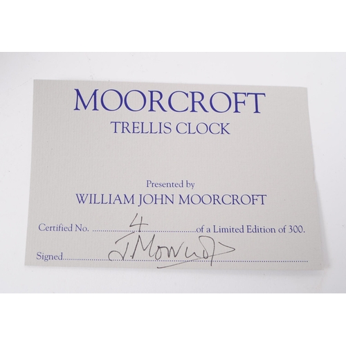 86 - Moorcroft Pottery - a limited edition hand painted ceramic Trellis Clock desk table clock. Limited e... 