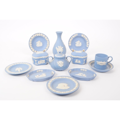 87 - A collection of vintage Wedgwood Jasperware bisque porcelain items. The lot to include five coffee s... 