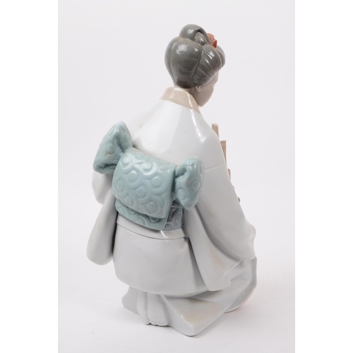 90 - LLadro, Spain - A large hand painted fine bone china porcelain figure of kneeling geisha. The figure... 