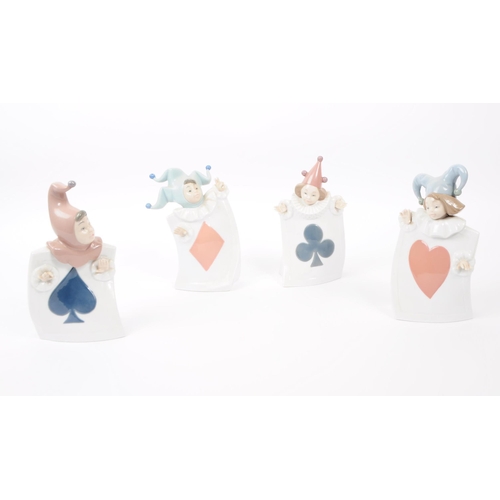 92 - Nao for Lladro, Spain - a full set of four hand painted fine bone china porcelain figures of childre... 