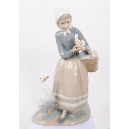 94 - LLadro, Spain - a collection of six hand painted fine bone china porcelain figures of ladies with fa... 