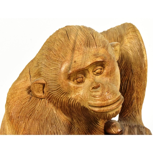 17 - Former Bristol Zoo Gardens - a 20th century hand carved wooden statue of a chimpanzee. Carved in a s... 