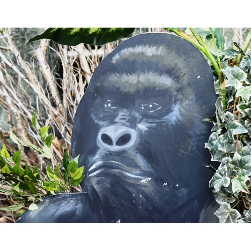 218 - Former Bristol Zoo Gardens - a wooden Gorilla standee, with added plastic foliage. Hand painted, wit... 