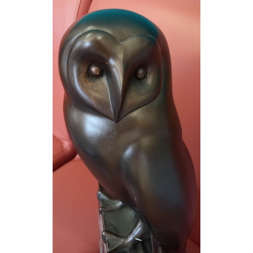 237 - Former Bristol Zoo Gardens - a 20th century bronze effect resin statue of an Owl. Featuring various ... 