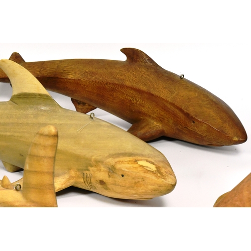 47 - Former Bristol Zoo Gardens - a collection of x7 carved hardwood shark sculptures. Each neatly carved... 