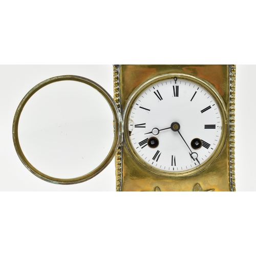 103 - Japy Freres, Paris - a French 19th century brass cased 8-day movement mantel clock. The clock having... 