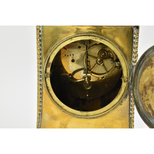 103 - Japy Freres, Paris - a French 19th century brass cased 8-day movement mantel clock. The clock having... 