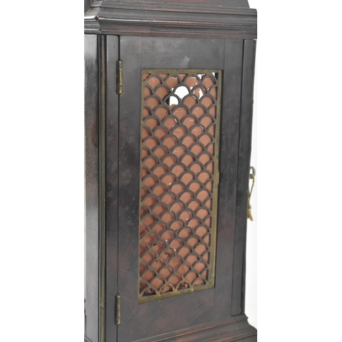 128 - A late 18th century single fusee mantle clock. The clock cased in flame mahogany, with steel engrave... 