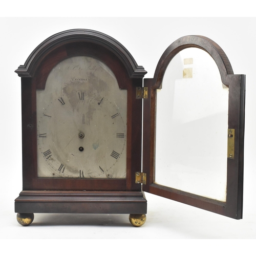 128 - A late 18th century single fusee mantle clock. The clock cased in flame mahogany, with steel engrave... 